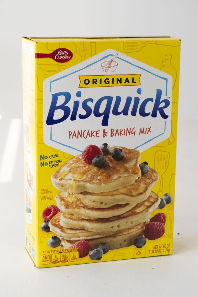 box of bisquick on table. 