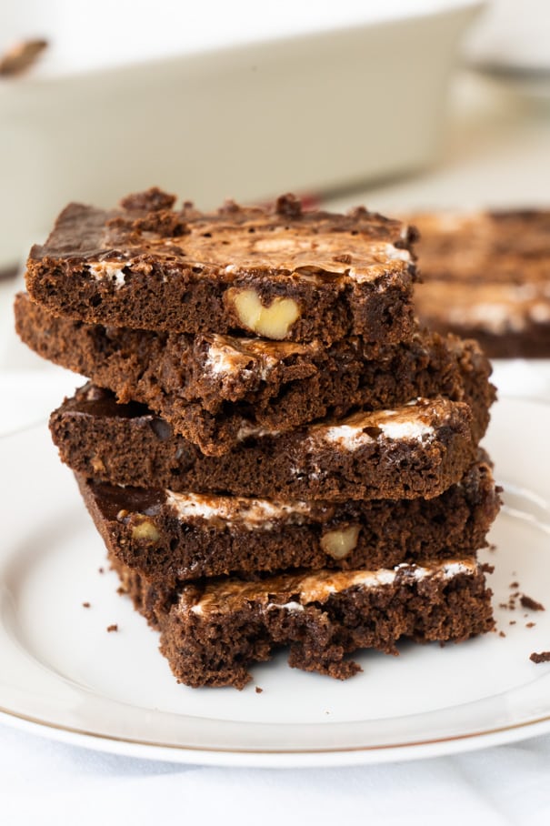 These Rocky Road Brownies are rich and fudgy bars loaded with walnuts and a layer of marshmallow fluff. A decadent treat that’s easy to make and perfect for feeding a crowd.