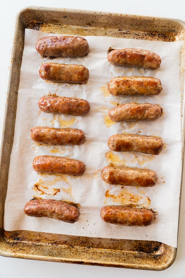 Easy steps on how to cook sausage in the oven.  In just 30 minutes you'll have delicious oven baked sausage for dinner . This works for all sausage links and patties!