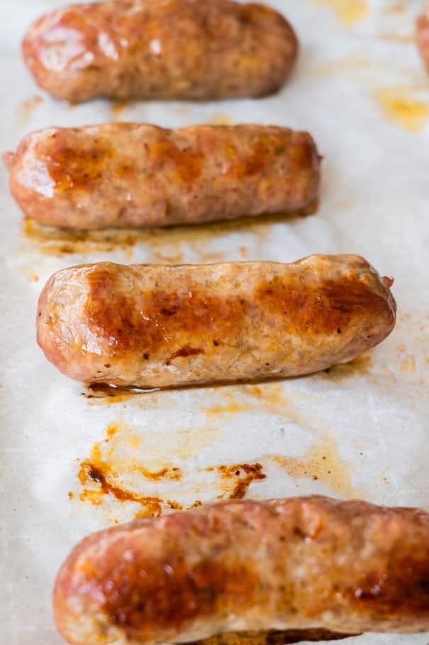 Easy steps on how to cook sausage in the oven.  In just 30 minutes you'll have delicious oven baked sausage for dinner . This works for all sausage links and patties!