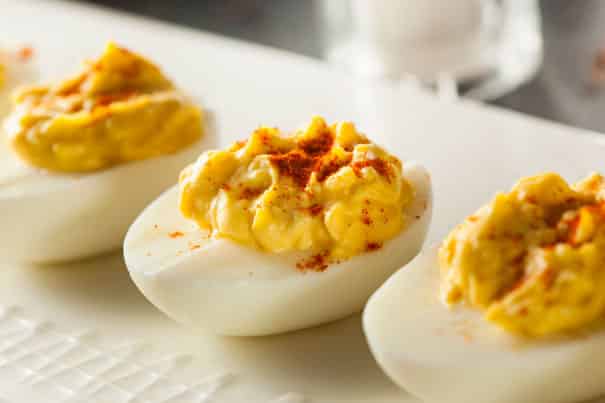 Easy No Mayo Deviled Eggs recipe.   These creamy deviled eggs are made with ranch dressing and cream cheese as a mayo substitute.  These are a favorite party appetizer! 