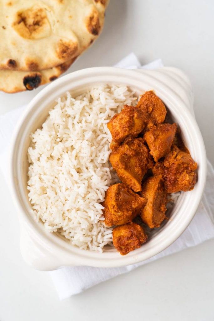 Easy, tasty Slow Cooker Butter Chicken recipe.  This authentic dinner tastes just like your favorite Indian restaurant, ready in 4 hours in the crockpot!  Serve with basmati rice and naan.