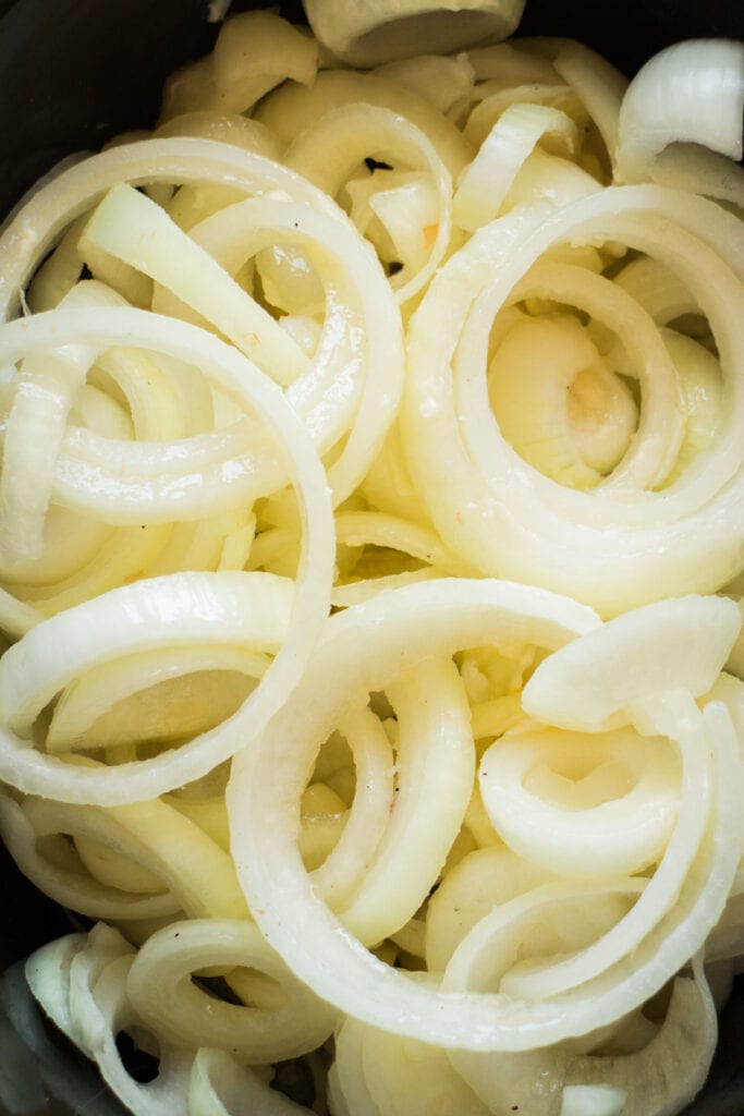 buttery onion slices in slow cooker.