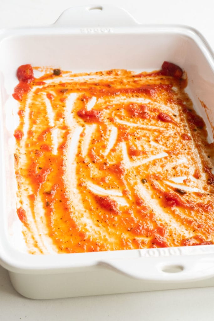 9x13 casserole dish with pasta sauce