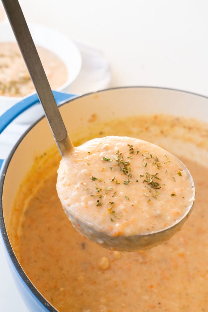 Easy to make healthy potato soup on the stovetop. You won't believe this creamy recipe doesn't need any milk or cheese!   Get ready to make the best potato soup ever! Vegetarian option available in recipe.