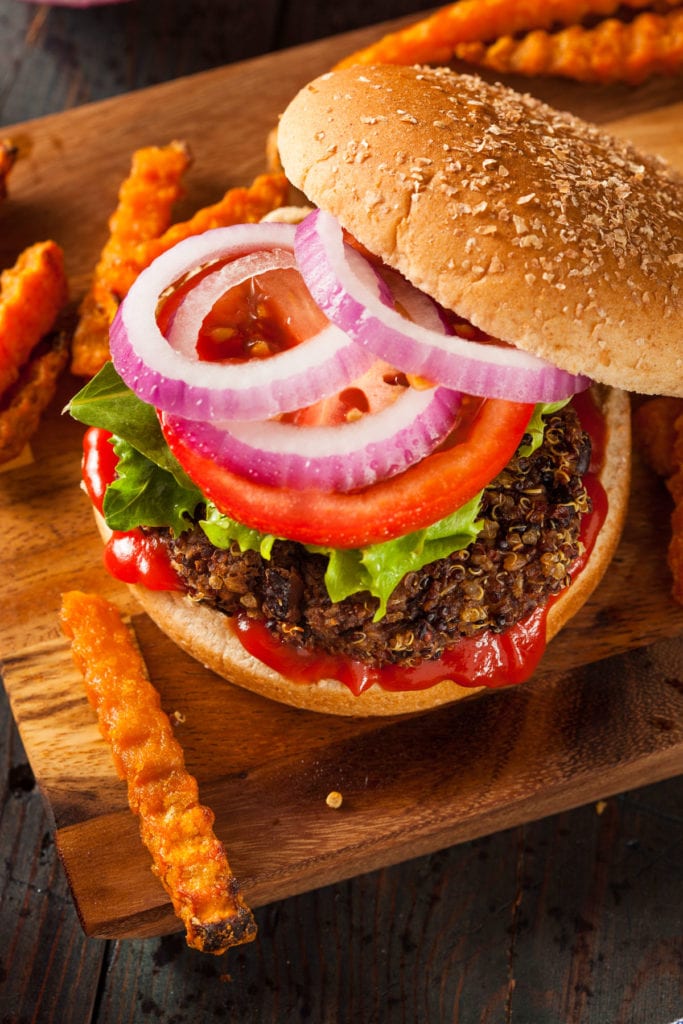 Best Vegetarian burger made with quinoa and black beans!  Burgers are baked in the oven to make more healthy. This easy recipe results in a juicy burger that even meat eaters will love!  