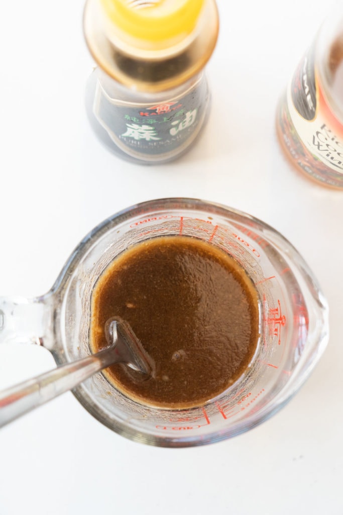 brown sauce in measuring cup