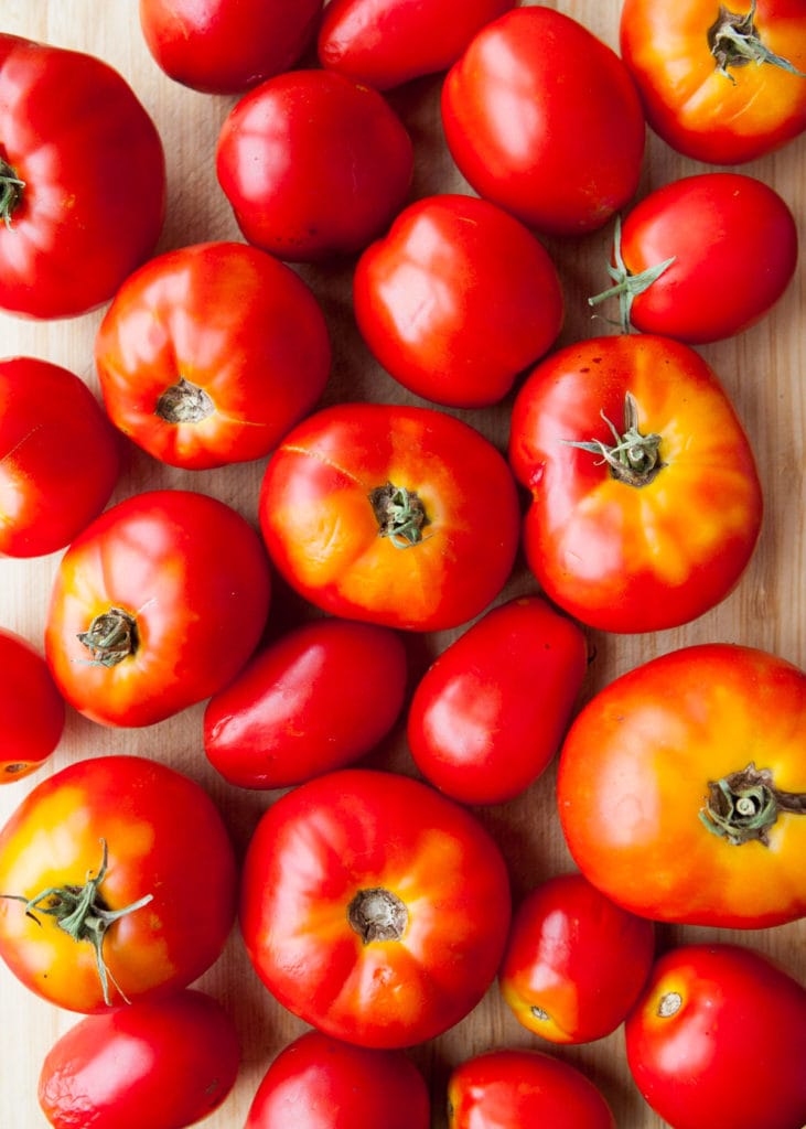 large red tomatoes on table