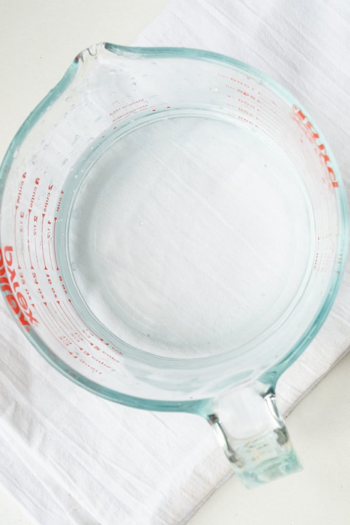 water in glass measuring cup