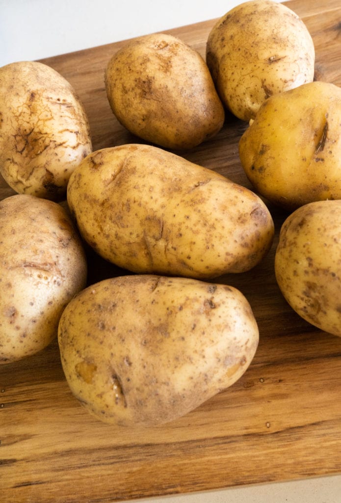 potatoes on cutting board