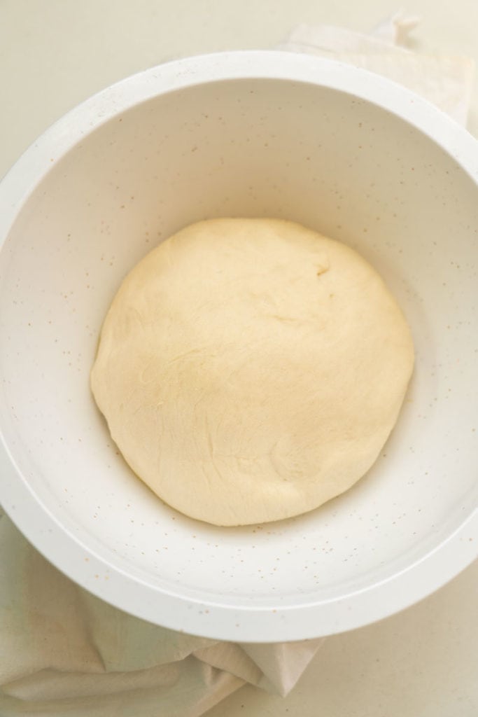 pizza dough ball in bowl