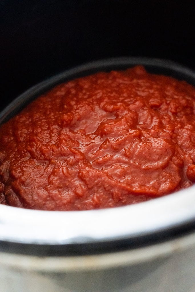crushed up tomatoes in slow cooker