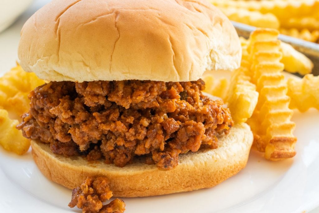 Homemade Sloppy Joes recipe that tastes better than Manwich and is ready in 35 minutes! Make a simple sauce with ketchup, brown sugar and cocoa powder!  I stopped buying canned sloppy joe sauce and only make my own now! 
