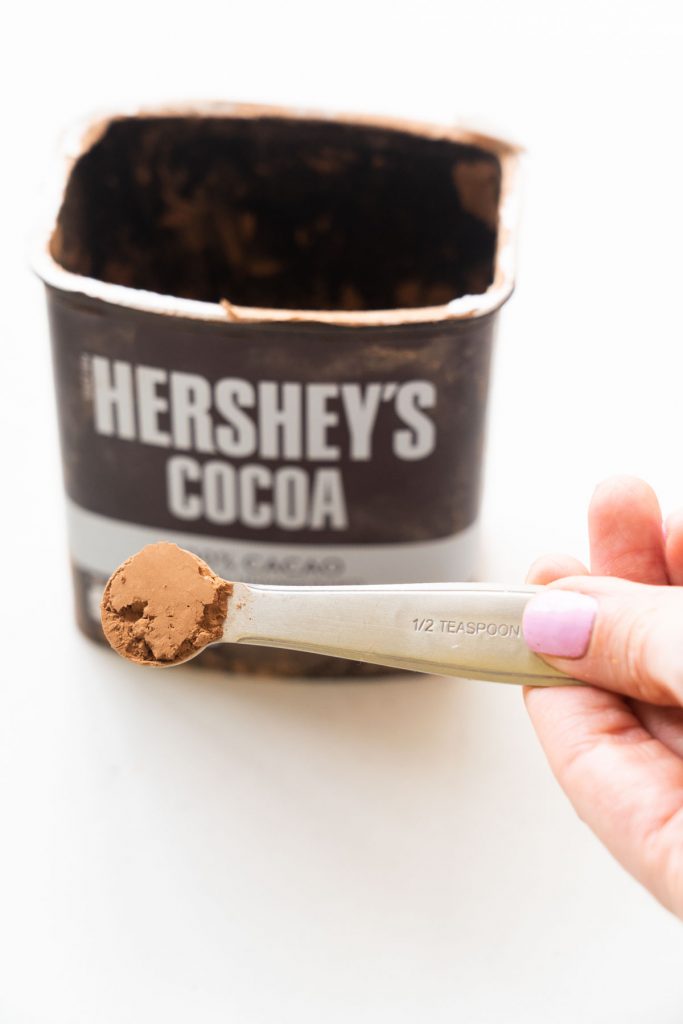 cocoa powder in spoon