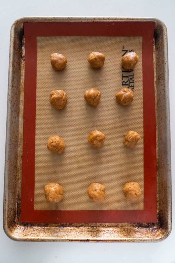 balls of cookie dough on cookie sheet