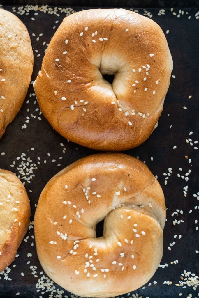 homemade bagels with sesame seeds on them