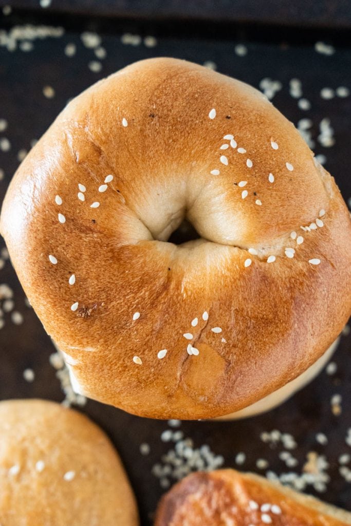 homemade bagels with sesame seeds on top