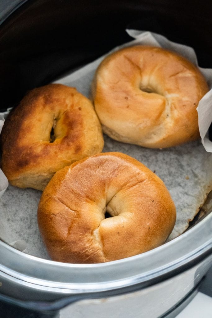 cooked homemade bagels in slow cooker