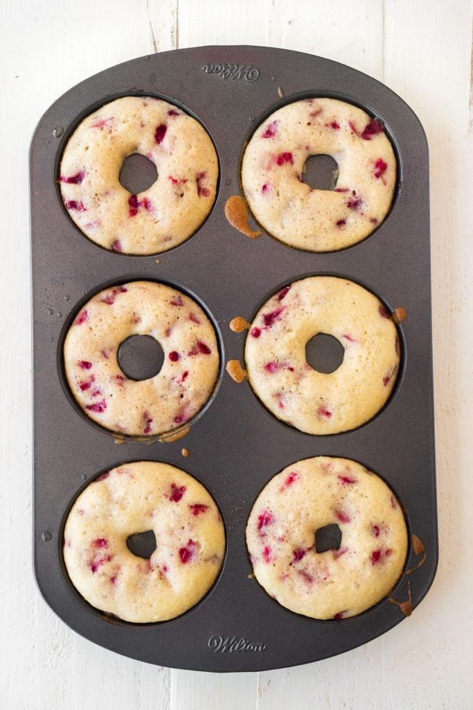 donuts baked in donut pan on white background