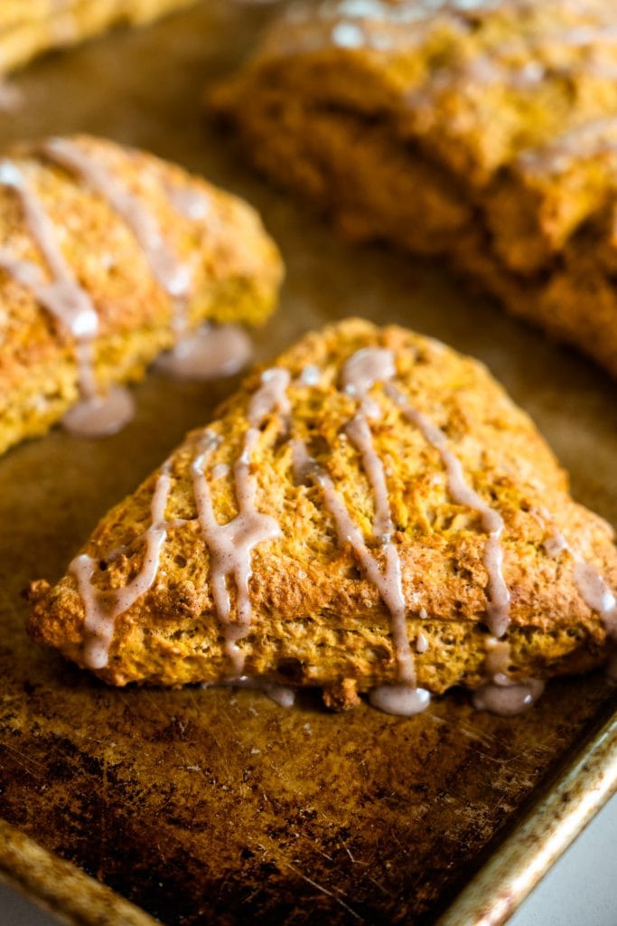 pumpkin scones on baking sheet