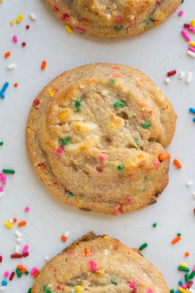 confetti cookies on white background with sprinkles