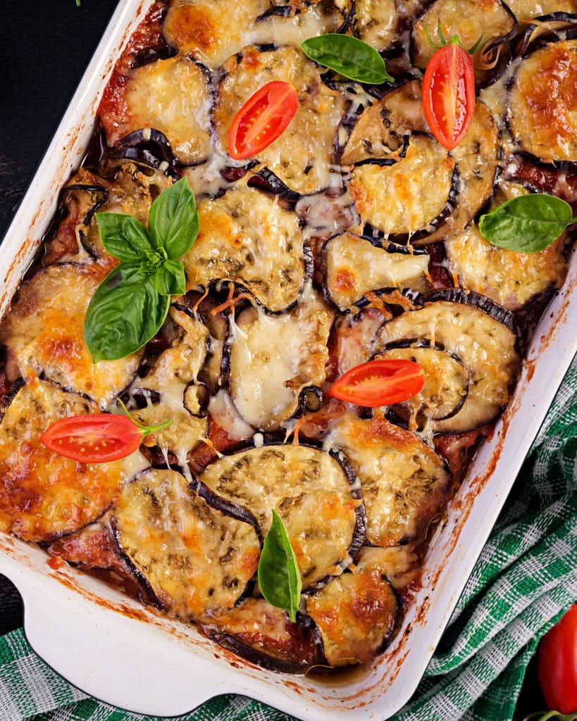 eggplant Parmesan casserole in baking dish on table
