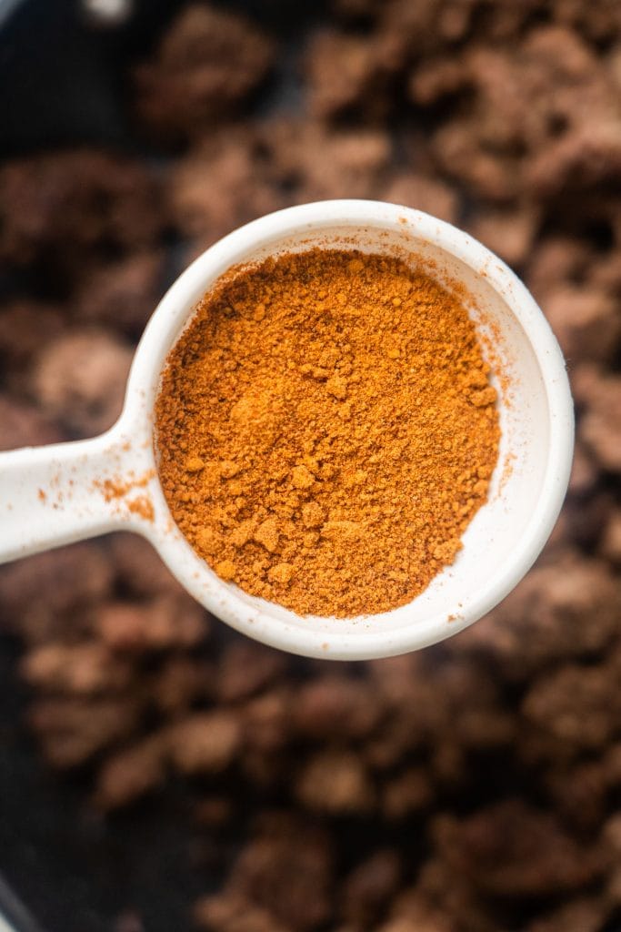 taco seasoning in measuring cup.