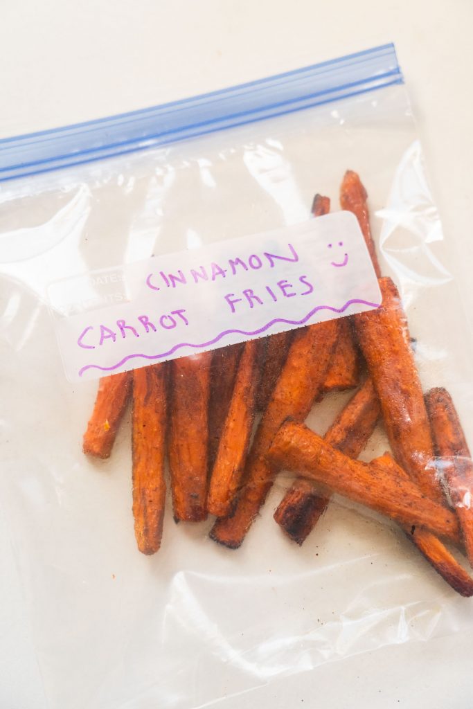 cinnamon carrot fries in freezer bag on table.