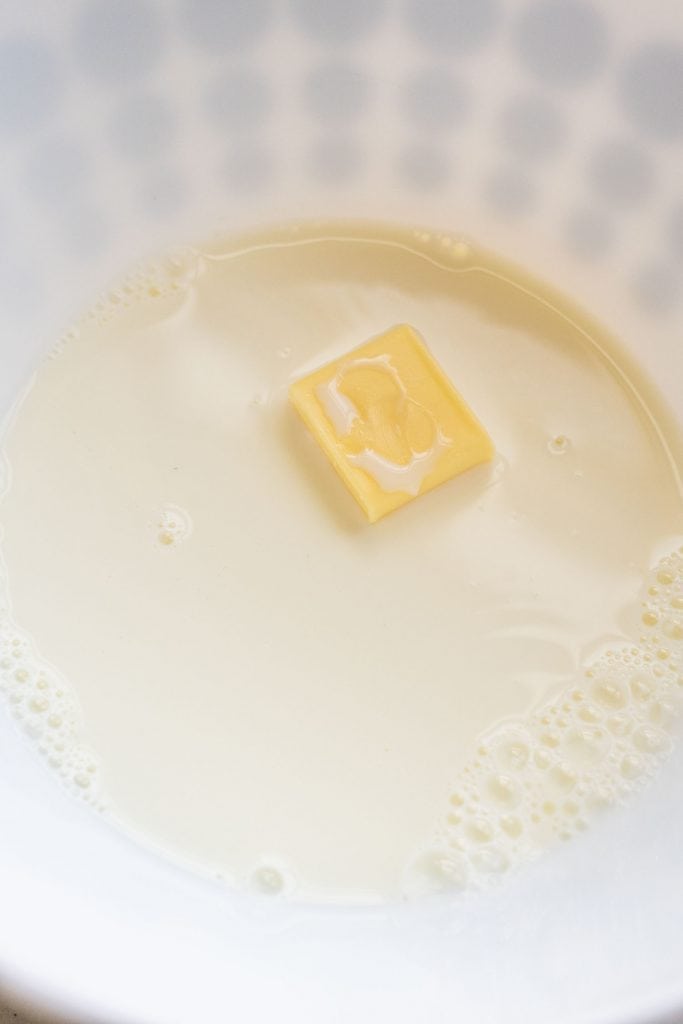 butter and milk in bowl.