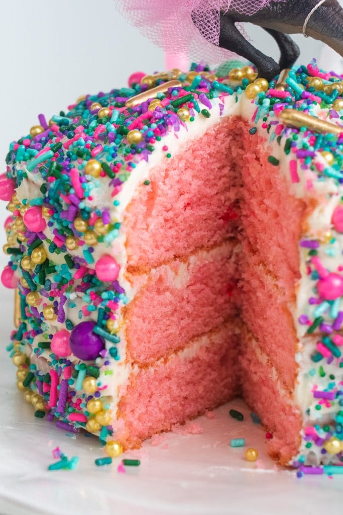 cake cut open revealing pink cake inside.