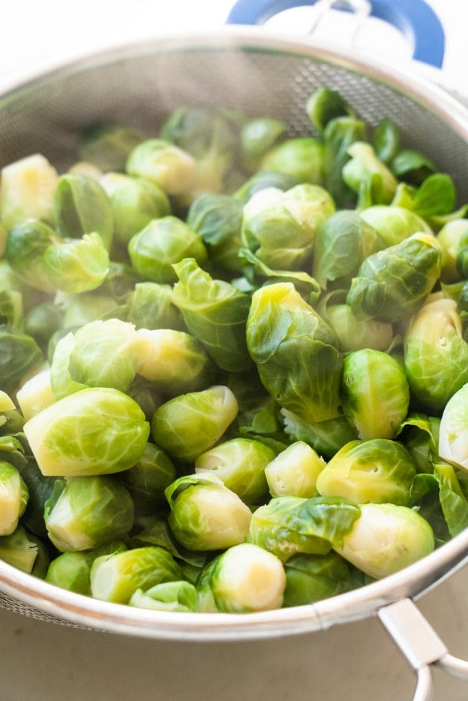 brussels sprouts with steam coming off of them.