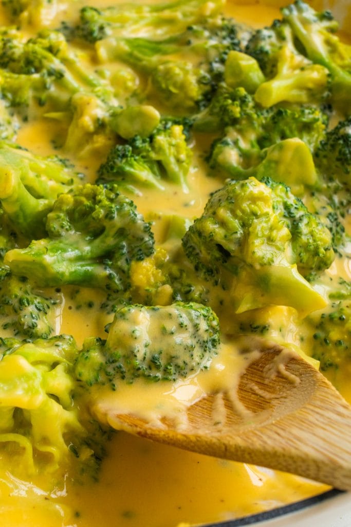closeup of cheesy broccoli.