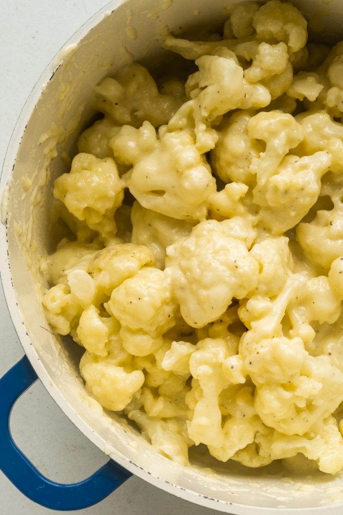 cauliflower with cheese in large pot.