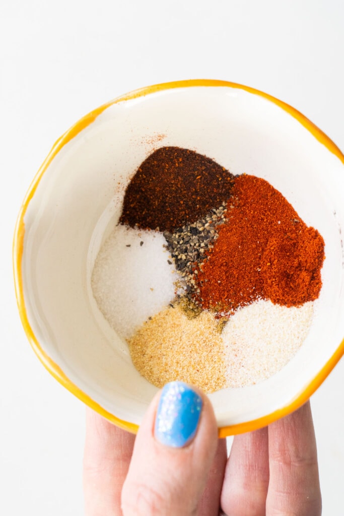 seasonings and spices in small white bowl.