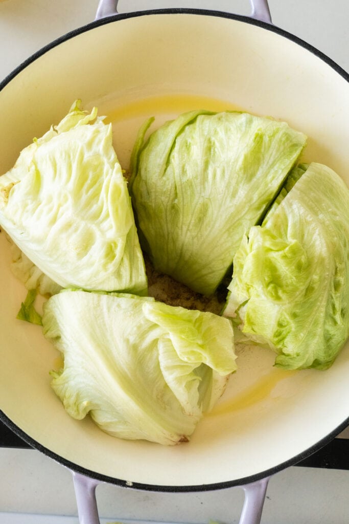 raw lettuce pieces in pan.