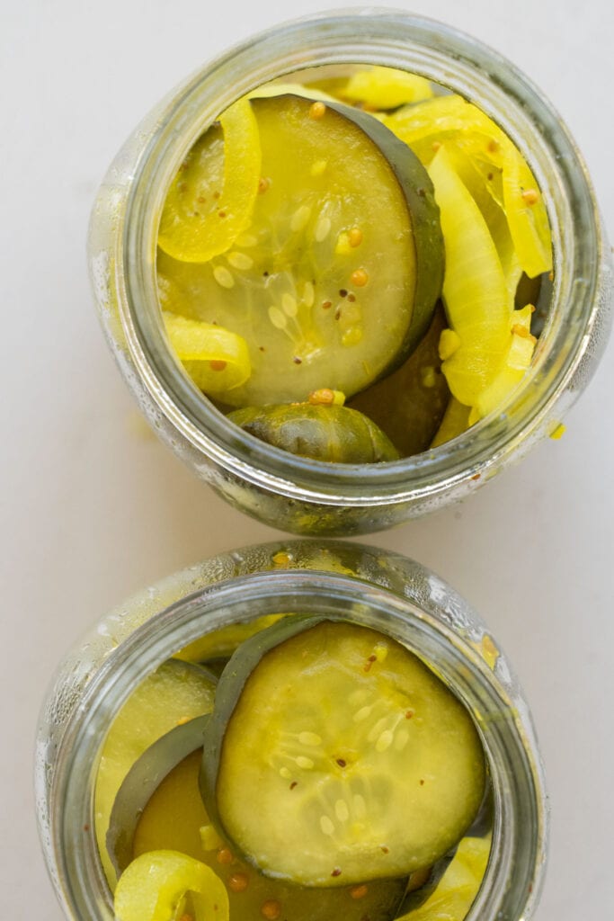 top down view of pickles in jar.