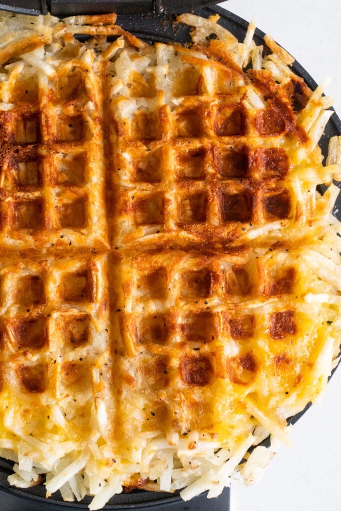 closeup of crispy cheesy hash browns.