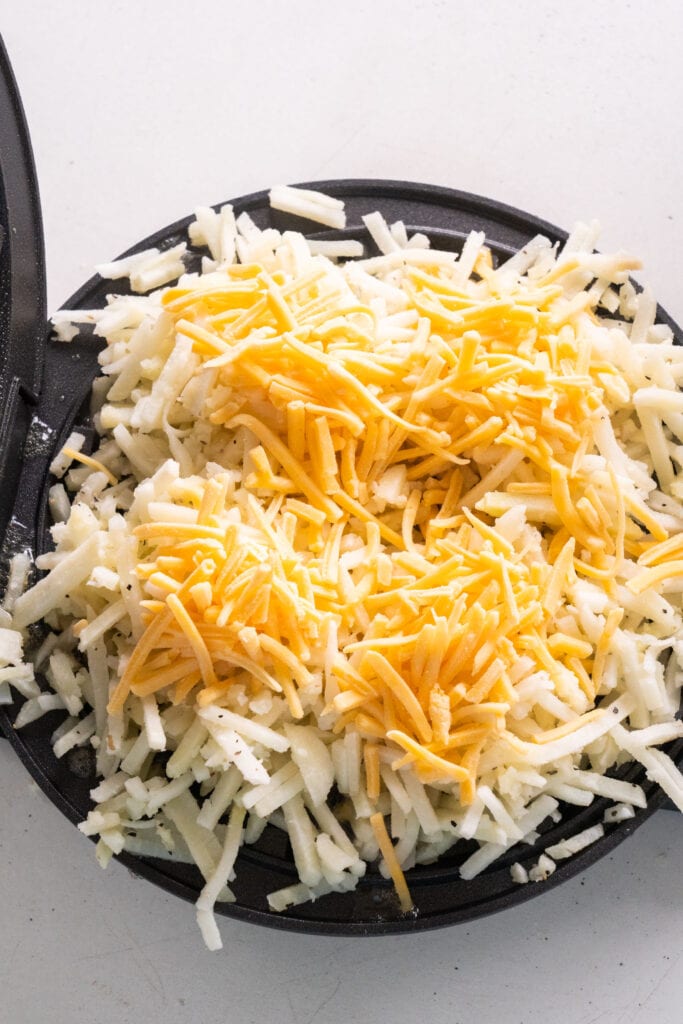 cheese on top of hash browns.