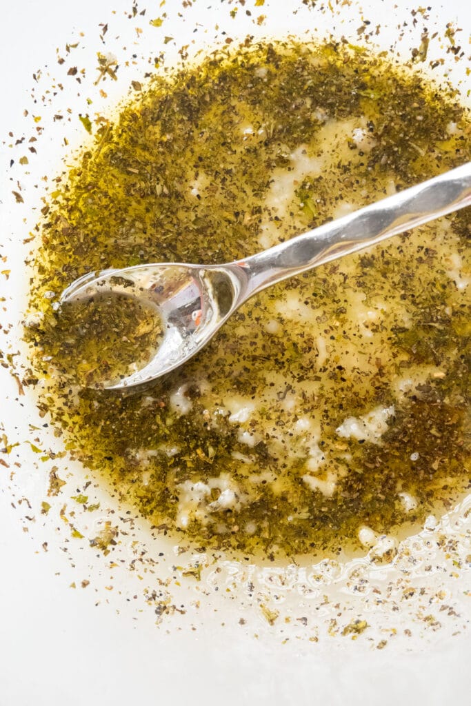 olive oil marinade in glass bowl. 