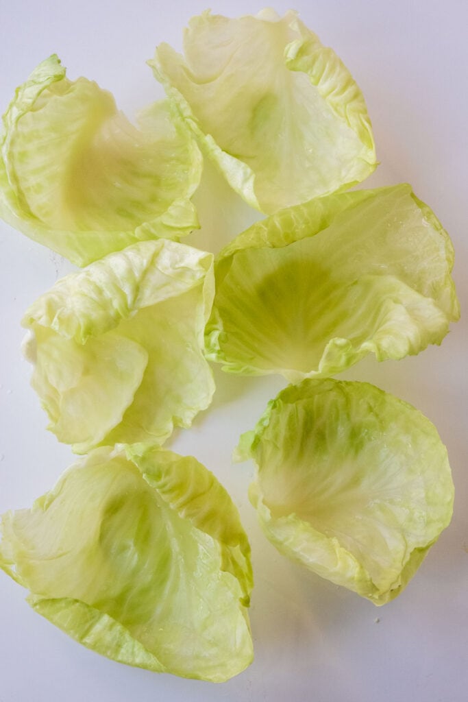 cabbage leaves on table.