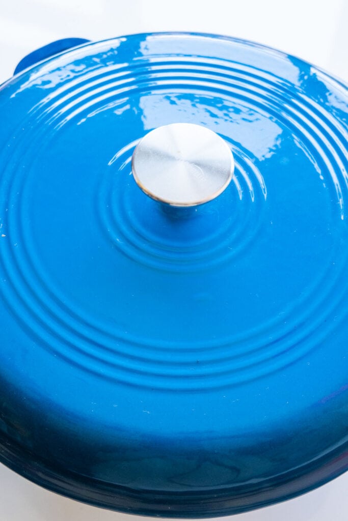 blue lid added on pot.