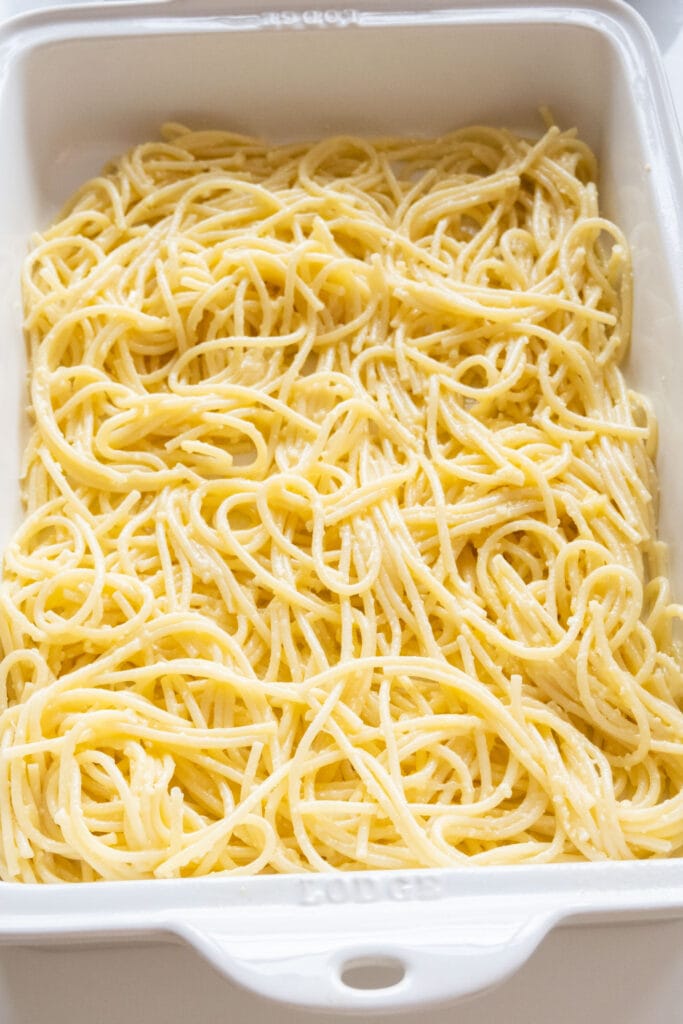spaghetti on the bottom of baking dish.