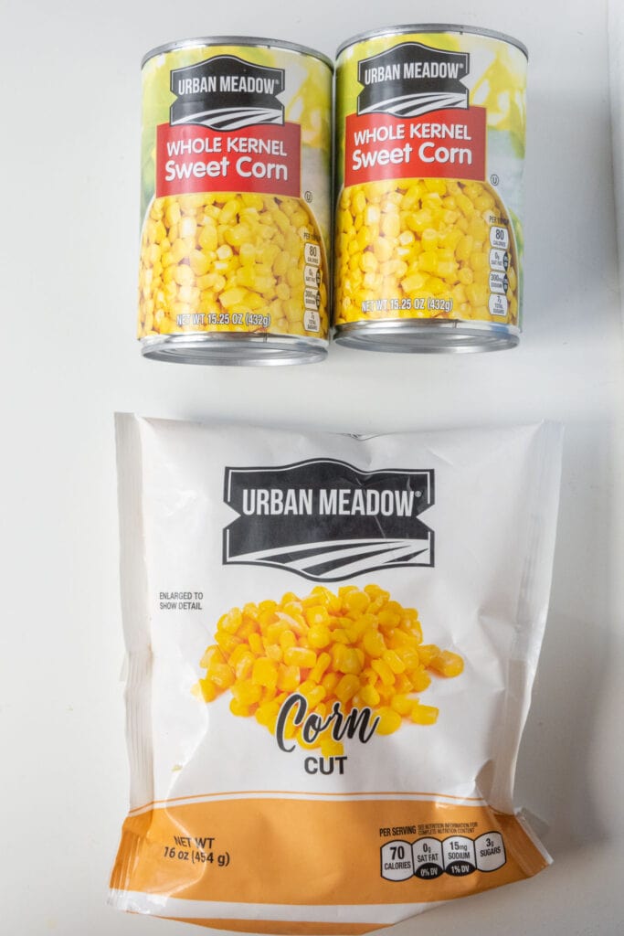 cans and frozen bags of corn.