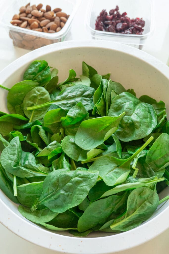 raw spinach in bowl.