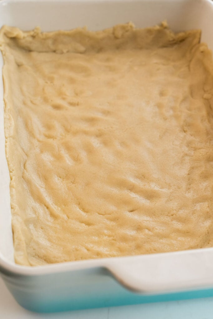 unbaked pie crust in baking dish.