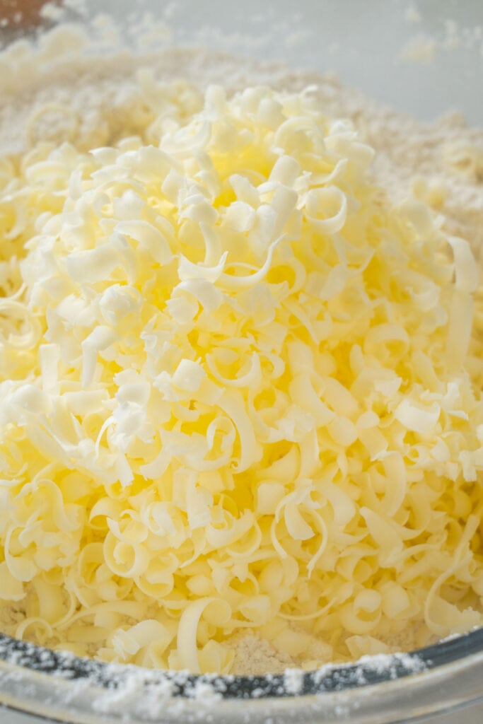 grated butter in bowl. 