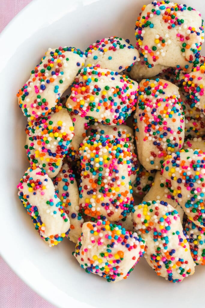 funfetti cookie bites in a bowl with rainbow sprinkles.