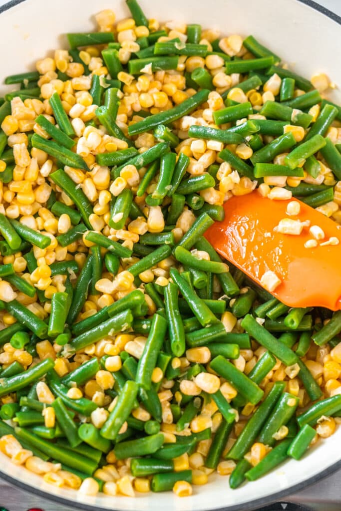 corn and green beans in skillet.
