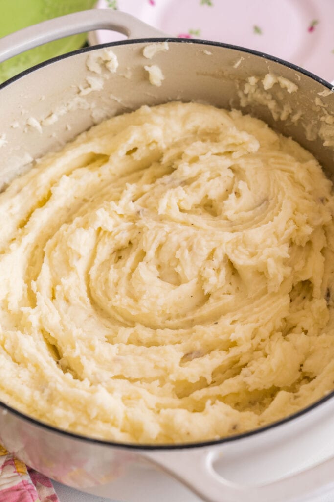 mashed potatoes in white pot.