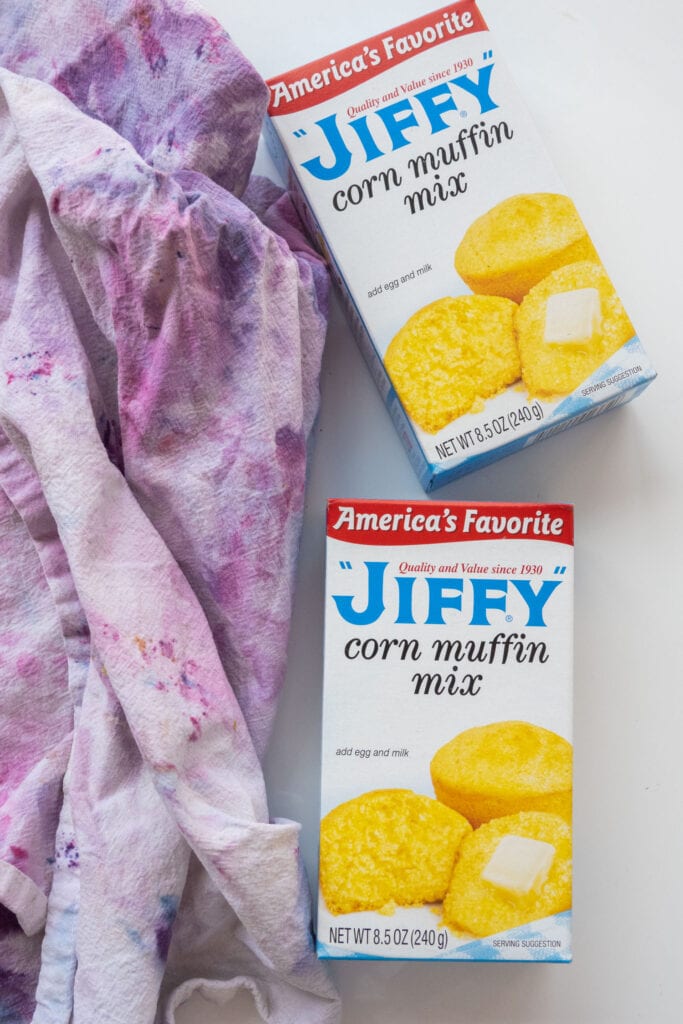 boxes of jiffy corn muffin mix on table.